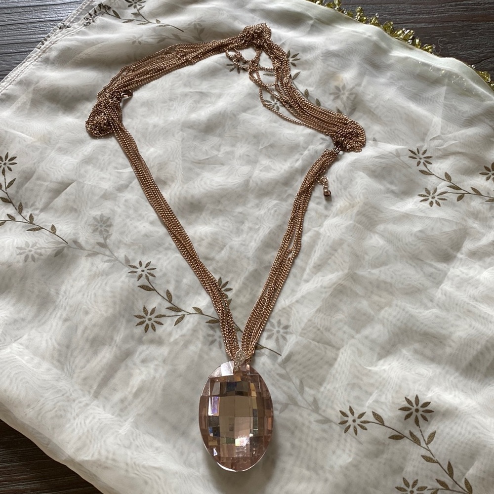 Rose gold long chain necklace with huge pink crystal. Very unique.